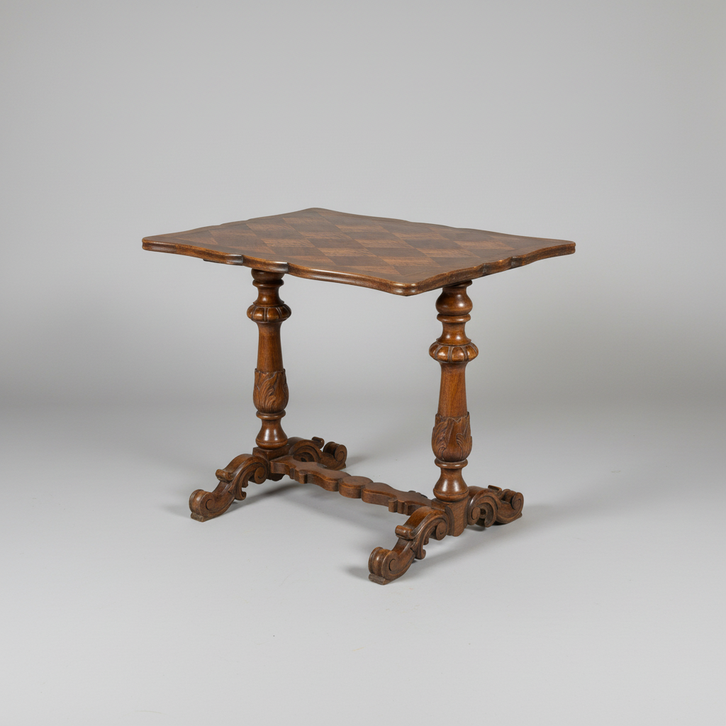 An antique wooden table with a checkered patterned top, turned legs, and a decorative stretcher, photographed on a neutral gray background.