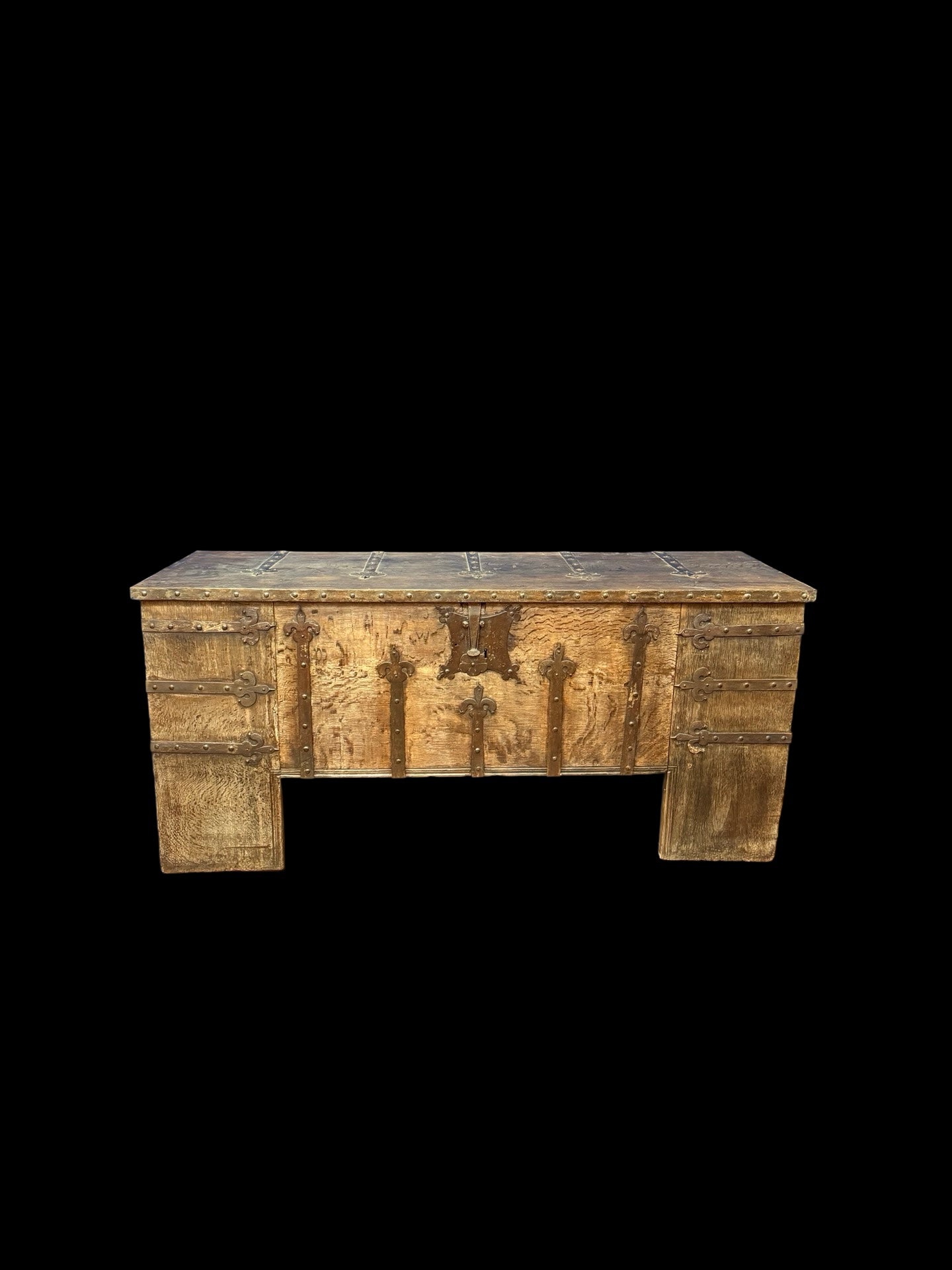 Large oak wood chest on black background. 