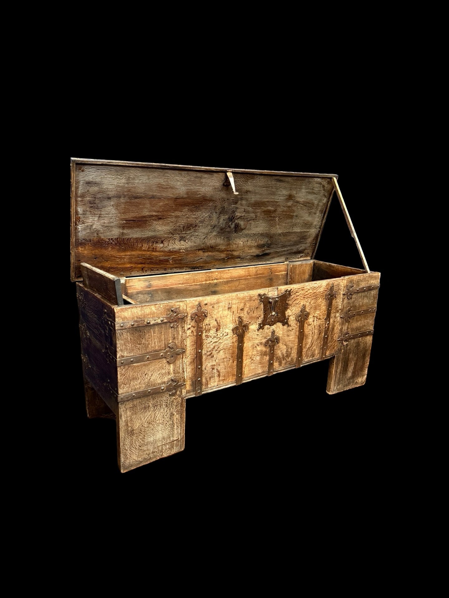 Wooden chest with a star design on a black background