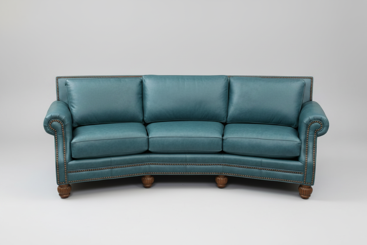 Blue leather sofa on a gray background