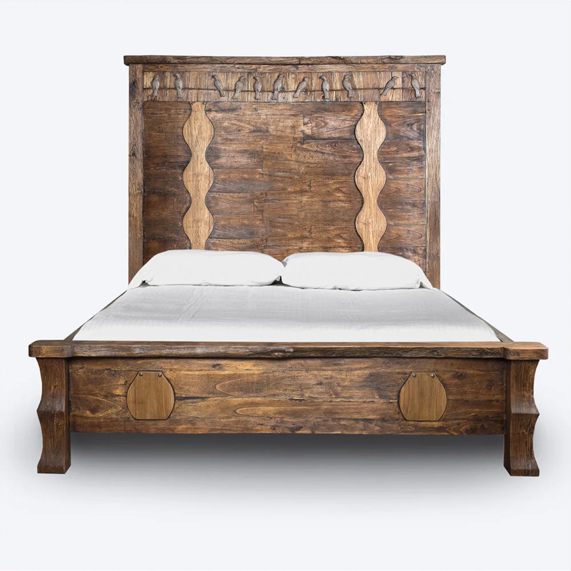Wooden bed with white bedding on a white background
