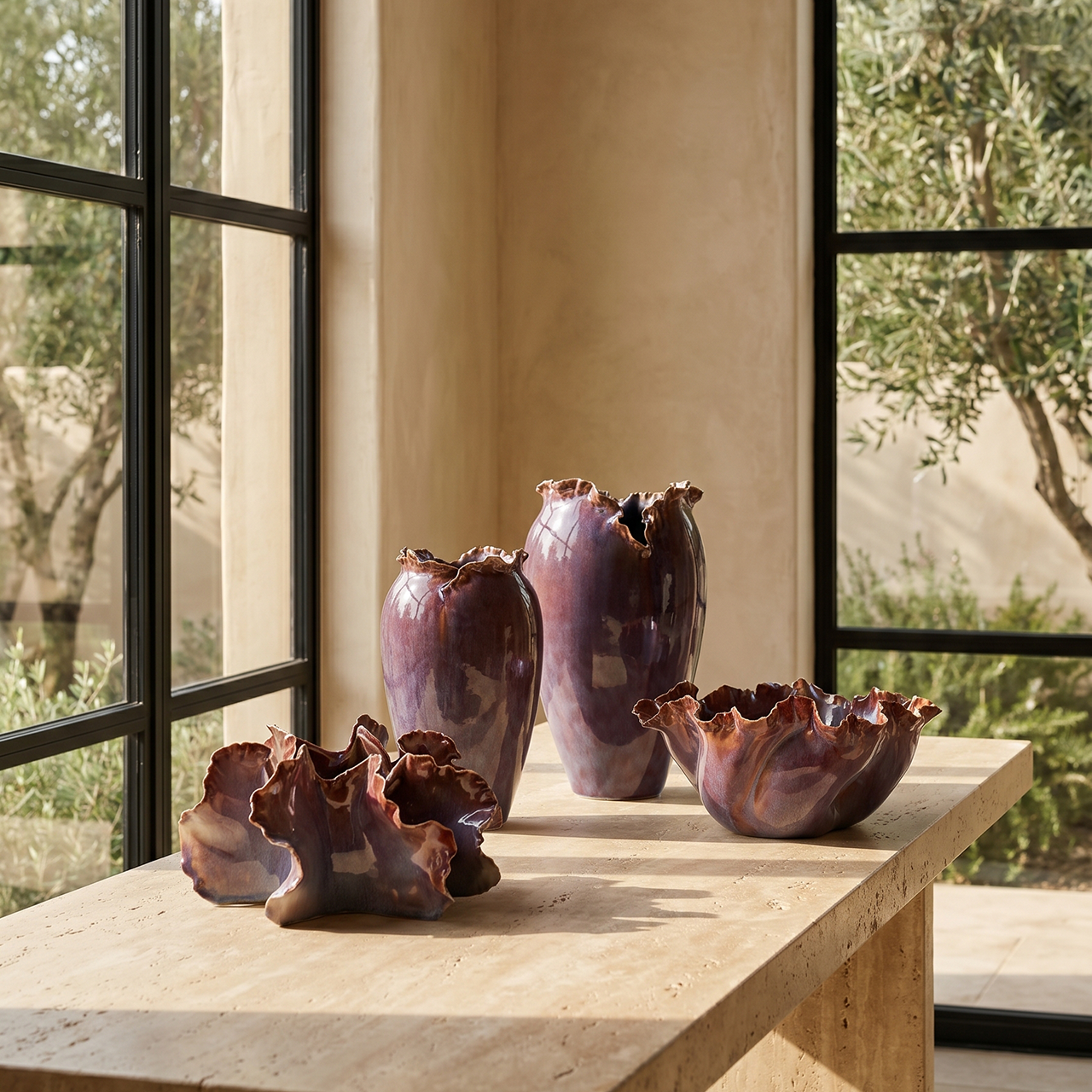purple ceramic pottery in a modern room at Fiesta Furnishings.