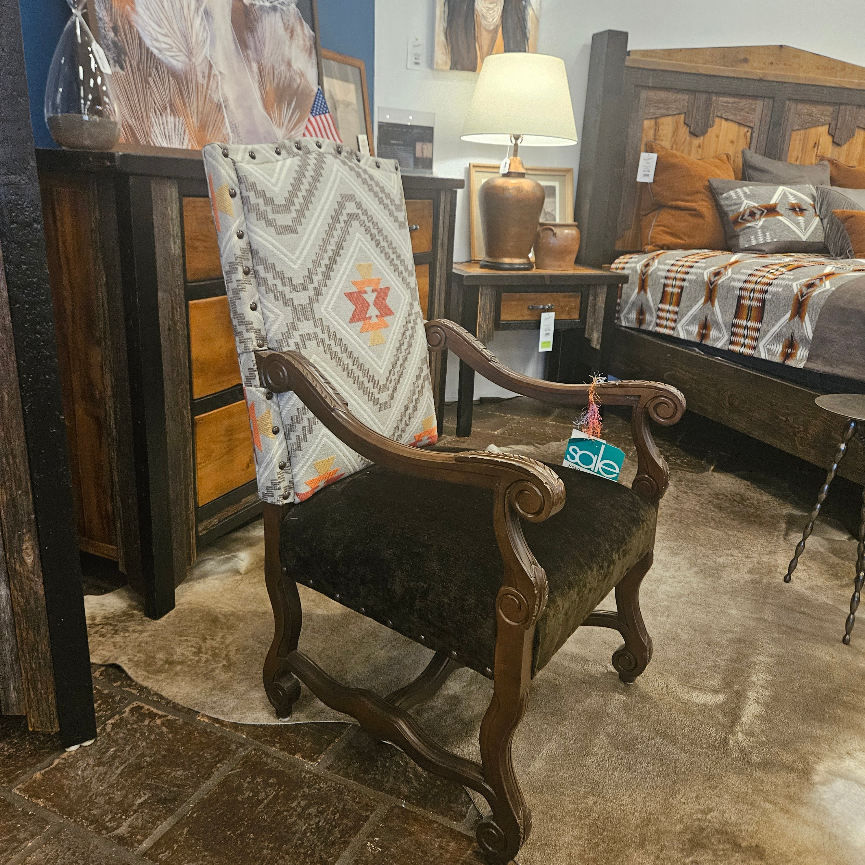Vintage wooden chair with patterned cushion against a textured wall